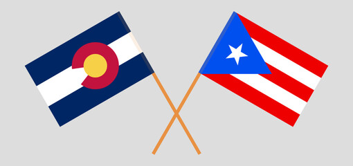 Crossed flags of The State of Colorado and Puerto Rico. Official colors. Correct proportion