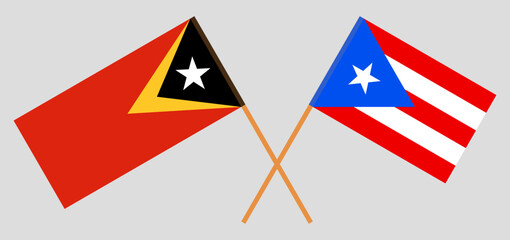 Crossed flags of East Timor and Puerto Rico. Official colors. Correct proportion