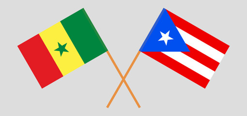 Fototapeta na wymiar Crossed flags of Senegal and Puerto Rico. Official colors. Correct proportion