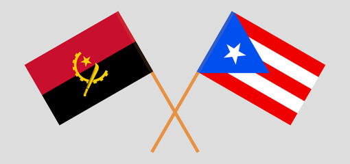 Crossed flags of Angola and Puerto Rico. Official colors. Correct proportion
