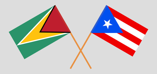 Crossed flags of Guyana and Puerto Rico. Official colors. Correct proportion