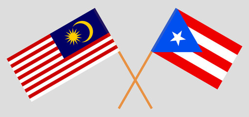 Crossed flags of Malaysia and Puerto Rico. Official colors. Correct proportion