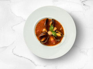 Mussel soup on a white background, food photography.