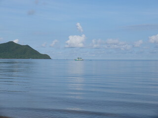 view of the sea and mountains from Bang Saray beach, Pattaya, Thailand.