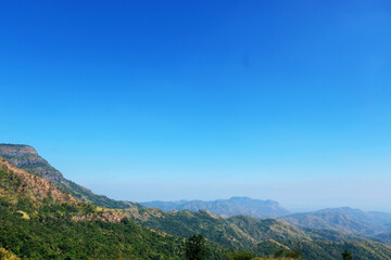 Mountain scape at Khao Kho National Park & Hot Springs in the morning at Phetchabun of Thailand in Winter, Sunny day and blue sky, Beautiful Natural View in Thailand, Natural wallpaper and background