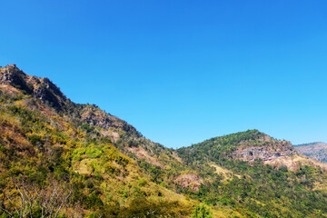 Mountain scape at Khao Kho National Park & Hot Springs in the morning at Phetchabun of Thailand in Winter, Sunny day and blue sky, Beautiful Natural View in Thailand, Natural wallpaper and background