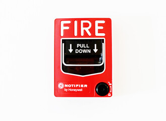 Close up the Fire button for a Fire alarm in the building, Every commercial building is required to have a fire alarm system, emergency or safety button alarm switch on the wall, equipment