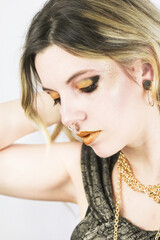 Fototapeta premium Gold Rock Portrait Fashion beauty tatooed piercing