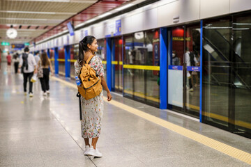 Bangkok Thailand, Portrait of Beautiful Asian woman tourist waiting for Skytrain at the railway...