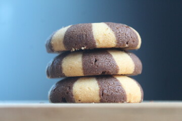 three biscuits on a wooden board