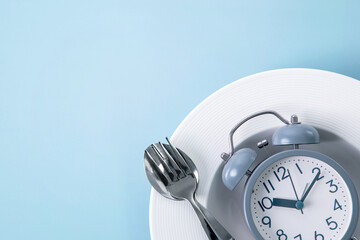 Time to lose weight , intermittent fasting eating control or time to diet concept , alarm clock...