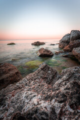 Fototapeta na wymiar sunset/ sunrise on the beach - Summer season Long exposure shot