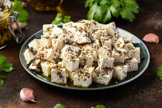 Vegan Tofu feta cheese with dried oregano, basil, thyme and garlic. Healthy Food.