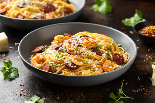 Prawn and chorizo pasta with cheese and herbs