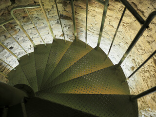 metal iron spiral staircase on the tower