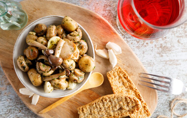 Mushrooms in garlic butter sauce. Mushrooms prepared with garlic , fresh butter and parsley served as a appetizer.