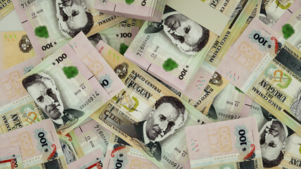 3D rendering of 100 Peso Uruguayo notes spread on surface
