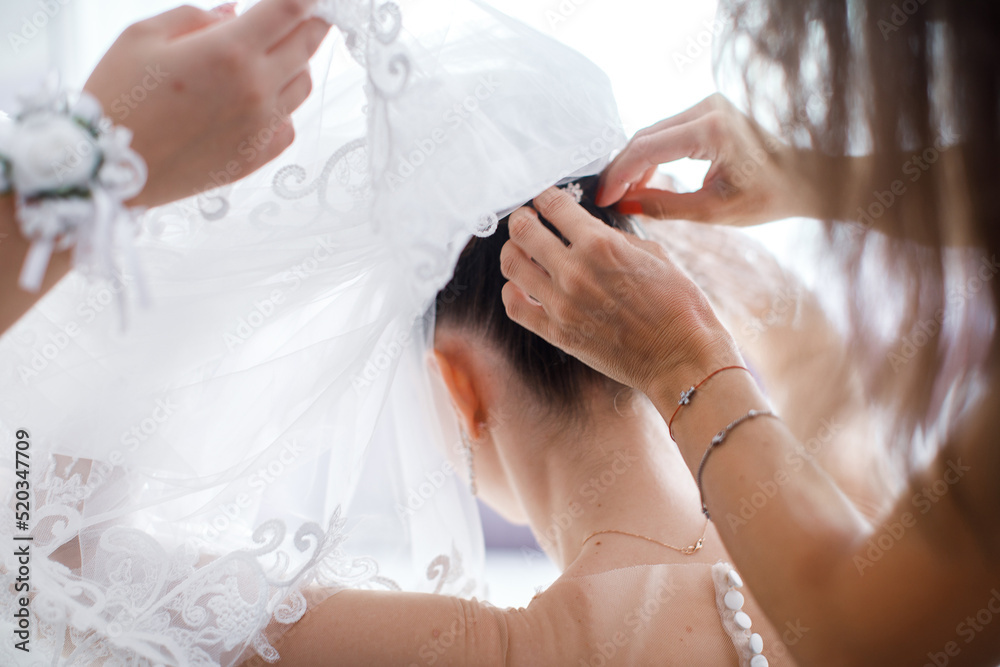 Wall mural Bride in the morning during wedding preparations