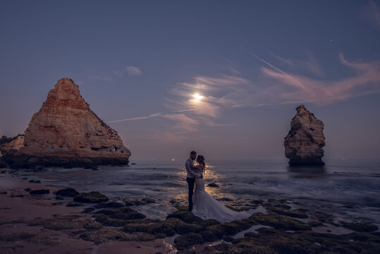 Wedding under the moon in the beach
