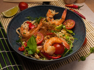 japanese buckwheat udon noodles with shrimp and vegetables