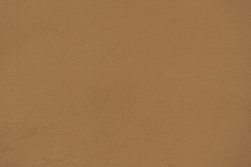Texture of pale orange painted wall