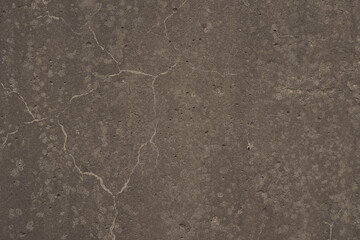 Fototapeta na wymiar Rough aged concrete texture with marks from elements