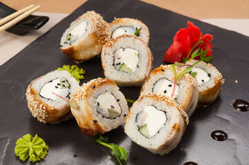 sushi rolls with shrimp, cucumber cream cheese and eel