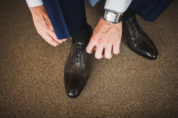 Groom in the morning during wedding preparations