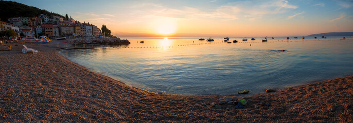 beautiful morning scenery at Moscenicka Draga beach sipar, adriatic ocean with boats