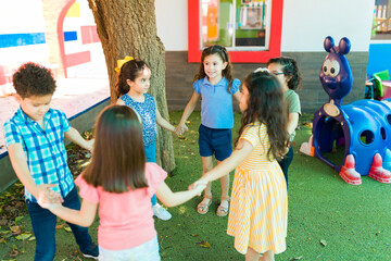 Group of preschool friends playing together