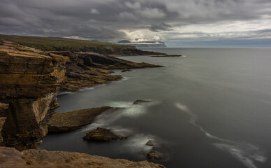 Cliffs at Yesnaby in Orkney, Scotland looking towards Hoy