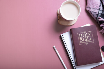 Holy Bible, note with plaid and Cup of Coffee top view. Holy Bible study concept