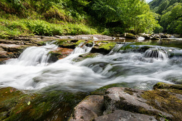 Long exposure of the waterfall at Watersmeet Bridge Pool at Watersmeet in Exmoor National Park