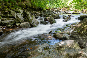 Long exposure of a waterfall on the East Lyn river at Watersmeet in Exmoor National Park