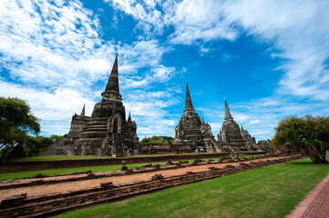 Fototapeta premium Landscape the ruins of ancient city of ayutthaya (Ayutthaya Historical Park) are the famous sightseeing place at Phra Nakhon Si Ayutthaya Province, Thailand. (Public domain)