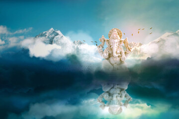Lord ganesha sculpture on mountain and sky background. - obrazy, fototapety, plakaty