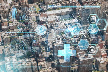 Aerial top view of New York City building roofs. Bird's eye view from helicopter of metropolis cityscape. Health care digital medicine hologram. The concept of treatment and disease prevention