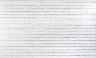 Large white brick gallery wall background. Full frame light stone wall pattern. Wide angle huge surface.