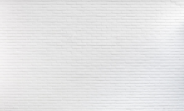Fototapeta Large white brick gallery wall background. Full frame light stone wall pattern. Wide angle huge surface.