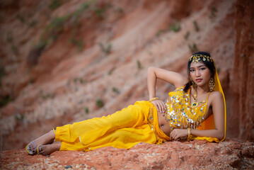 Portrait of asian beautiful sexy woman wear in arab costume,Princess of desert concept