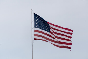 The American Flag Flying In The Wind