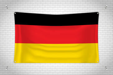 Germany flag hanging on brick wall. 3D drawing. Flag attached to the wall. Neatly drawing in groups on separate layers for easy editing.