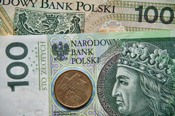 polski banknot i norweska moneta, Polish banknote and Norwegian coin - obrazy, fototapety, plakaty