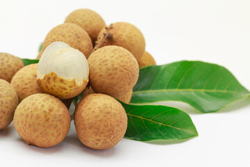 Fruit fresh longan with leaf  on a white background,  close up