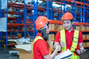 worker person working with safety in warehouse logistic factory, business manufacturing industry occupation concept, goods product box distribution. Storehouse employee in uniform. warehouse worker.