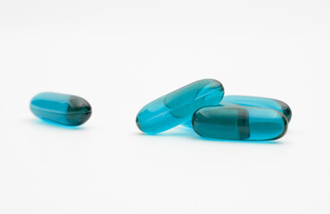 blue transparent supplement capsule isolated