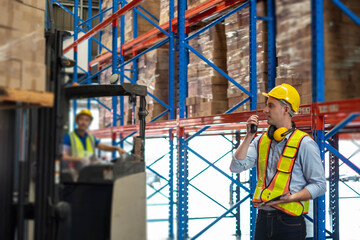 Fototapeta premium worker person working with safety in warehouse logistic factory, business manufacturing industry occupation concept, goods product box distribution. Storehouse employee in uniform. warehouse worker.