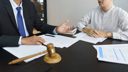 Lawyer and legal concept, Senior lawyer give legal advice regarding legality of business contract