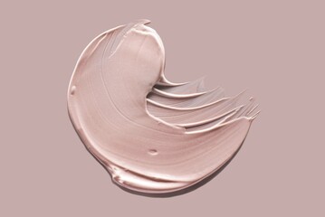 Cosmetic shimmering oil gel pink texture background