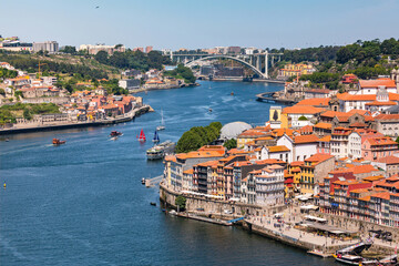 Panoramic view of the center of Porto as well as the Douro riverbank and the Ponte da Arrabida, Portugal - obrazy, fototapety, plakaty